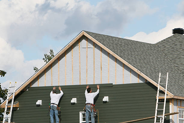Professional Siding technician working in Bovard, PA